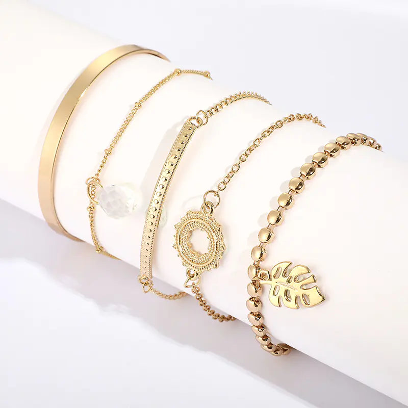 Set of 4 Boho Bracelets with Stars, Moons, and Leaves