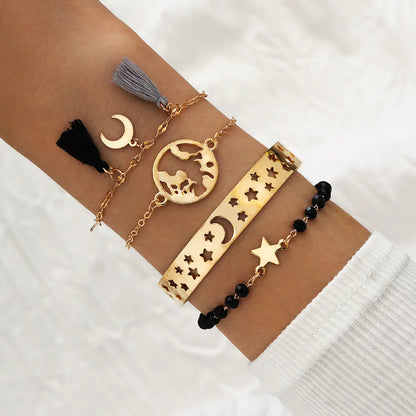 Set of 4 Boho Bracelets with Stars, Moons, and Leaves