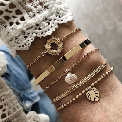 Set of 4 Boho Bracelets with Stars, Moons, and Leaves